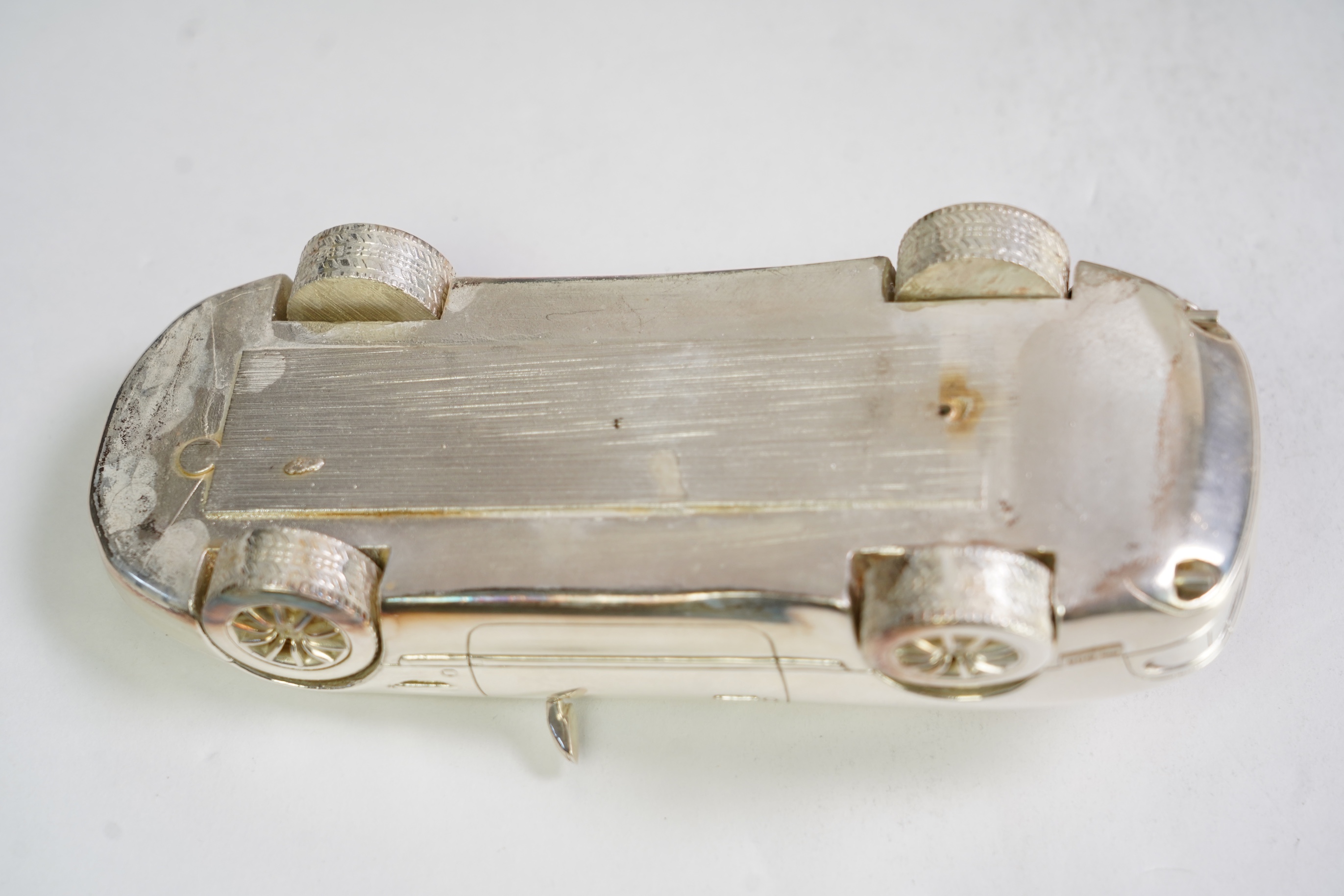 An Elizabeth II miniature silver model of an Aston Martin DB7 Vantage, by Aston Martin Lagonda Design Ltd